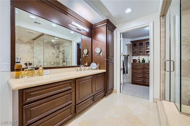 9103 Alta Dr Unit 407, Las Vegas, NV 89145 - full bathroom featuring a shower stall, vanity, recessed lighting, and baseboards