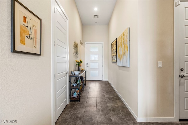 11672 Barga Ct, Las Vegas, NV 89138 - entryway featuring dark tile patterned flooring and baseboards