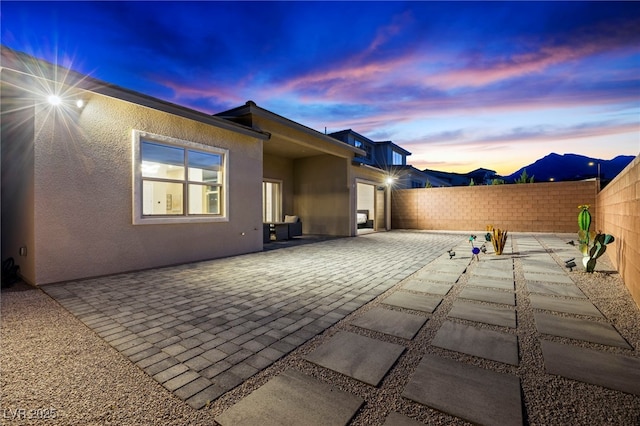 11672 Barga Ct, Las Vegas, NV 89138 - fenced backyard with a patio and a garage