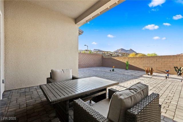 11672 Barga Ct, Las Vegas, NV 89138 - fenced backyard with a patio and outdoor dining area
