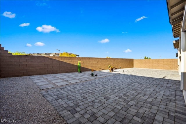 11672 Barga Ct, Las Vegas, NV 89138 - fenced backyard with a patio area