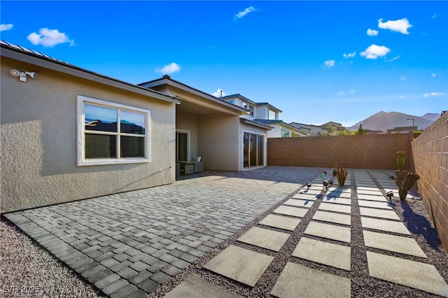 11672 Barga Ct, Las Vegas, NV 89138 - fenced backyard with a patio