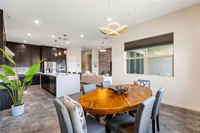 11672 Barga Ct, Las Vegas, NV 89138 - dining space featuring recessed lighting, a chandelier, and baseboards