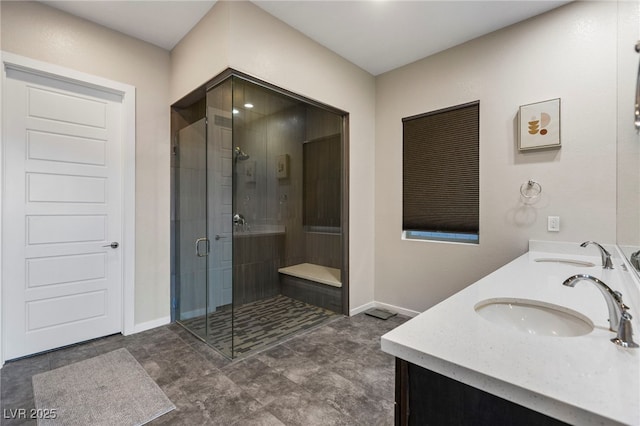 11672 Barga Ct, Las Vegas, NV 89138 - bathroom with baseboards, a shower stall, and double vanity