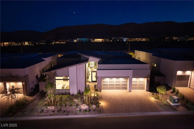 10781 Agate Cliffs Ave, Las Vegas, NV 89135 - view of front facade with driveway and a garage