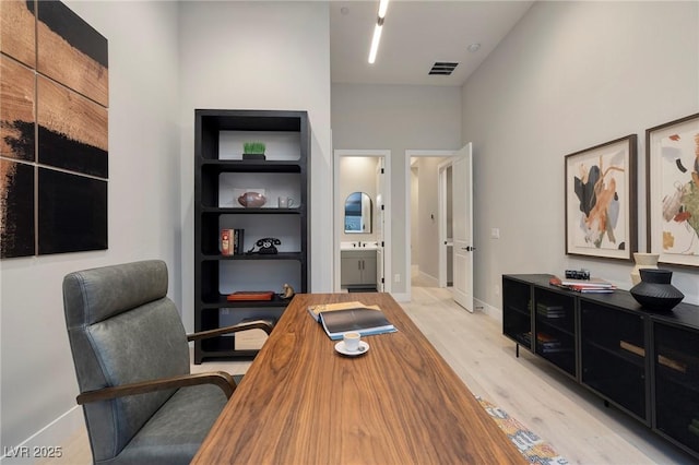10781 Agate Cliffs Ave, Las Vegas, NV 89135 - office with light wood finished floors