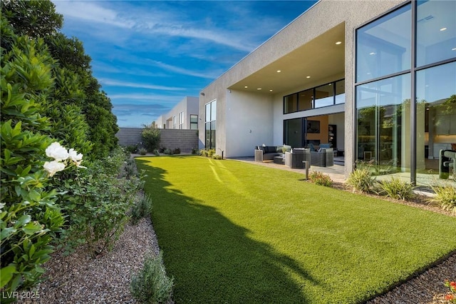 10781 Agate Cliffs Ave, Las Vegas, NV 89135 - view of yard with an outdoor hangout area and a patio area