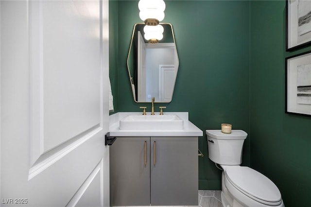 10781 Agate Cliffs Ave, Las Vegas, NV 89135 - bathroom featuring toilet, vanity, and tile patterned floors
