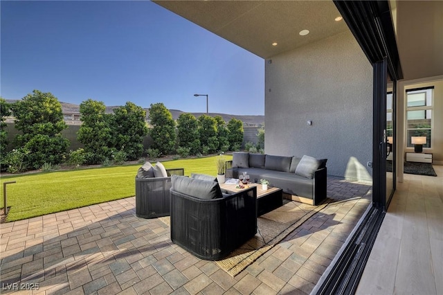 10781 Agate Cliffs Ave, Las Vegas, NV 89135 - view of patio with an outdoor living space