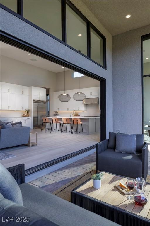 10781 Agate Cliffs Ave, Las Vegas, NV 89135 - living room featuring a towering ceiling