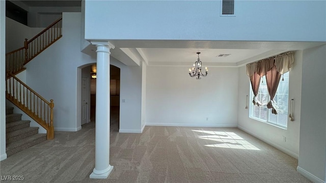 10066 Golden Bluff Ave, Las Vegas, NV 89148 - unfurnished dining area with carpet flooring, arched walkways, stairs, and a chandelier