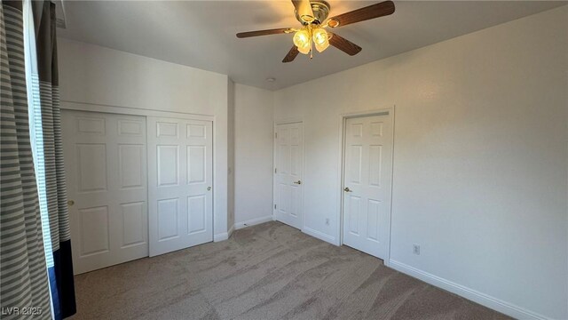 10066 Golden Bluff Ave, Las Vegas, NV 89148 - unfurnished bedroom featuring carpet flooring, baseboards, a closet, and a ceiling fan