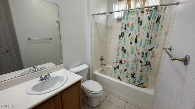 10066 Golden Bluff Ave, Las Vegas, NV 89148 - bathroom featuring toilet, shower / bath combination with curtain, vanity, and tile patterned flooring