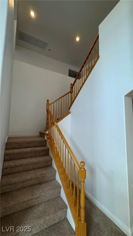 10066 Golden Bluff Ave, Las Vegas, NV 89148 - stairs featuring recessed lighting, carpet flooring, and baseboards
