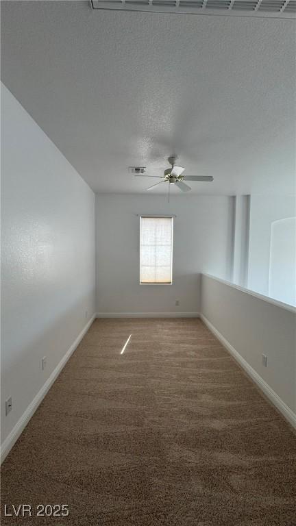 10066 Golden Bluff Ave, Las Vegas, NV 89148 - spare room with a ceiling fan, light carpet, and baseboards