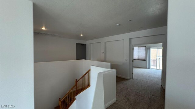10066 Golden Bluff Ave, Las Vegas, NV 89148 - hall featuring an upstairs landing, carpet floors, recessed lighting, and baseboards