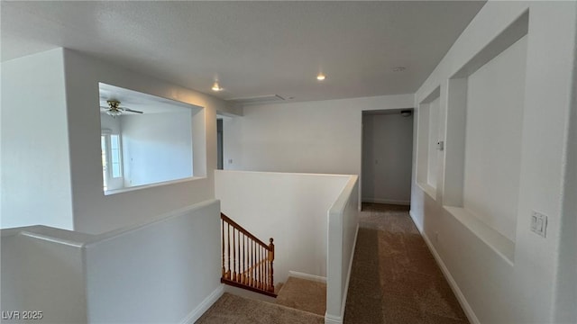 10066 Golden Bluff Ave, Las Vegas, NV 89148 - hallway featuring an upstairs landing, carpet flooring, recessed lighting, and baseboards