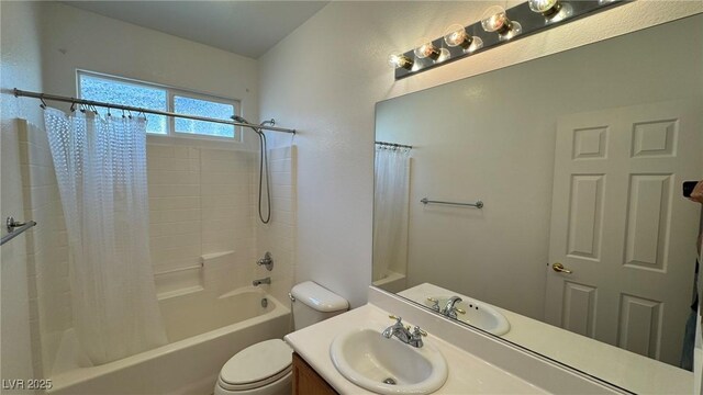 10066 Golden Bluff Ave, Las Vegas, NV 89148 - bathroom featuring shower / bath combo, vanity, and toilet