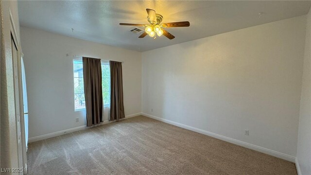 10066 Golden Bluff Ave, Las Vegas, NV 89148 - unfurnished room with ceiling fan, light carpet, and baseboards