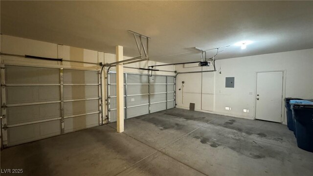 10066 Golden Bluff Ave, Las Vegas, NV 89148 - garage featuring a garage door opener and electric panel