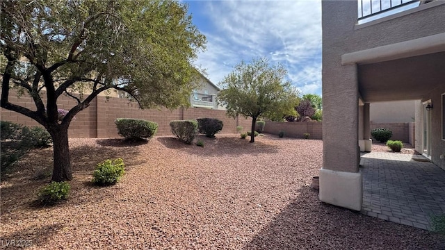 10066 Golden Bluff Ave, Las Vegas, NV 89148 - fenced backyard featuring a patio area