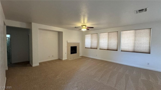 10066 Golden Bluff Ave, Las Vegas, NV 89148 - unfurnished living room with a ceiling fan, carpet flooring, a fireplace, and baseboards