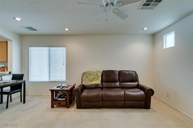 7645 Interlace St, Las Vegas, NV 89149 - living area featuring light colored carpet, a ceiling fan, baseboards, and recessed lighting