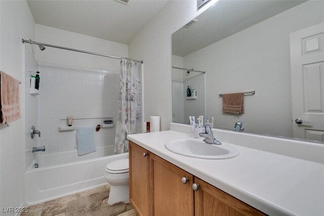 7645 Interlace St, Las Vegas, NV 89149 - full bathroom with toilet, vanity, and shower / tub combo with curtain