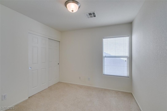 7645 Interlace St, Las Vegas, NV 89149 - unfurnished bedroom with carpet floors, a closet, and baseboards