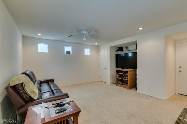 7645 Interlace St, Las Vegas, NV 89149 - living room with ceiling fan, recessed lighting, light colored carpet, and baseboards