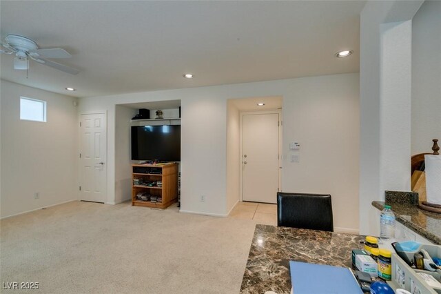 7645 Interlace St, Las Vegas, NV 89149 - living area with ceiling fan, recessed lighting, light colored carpet, and baseboards