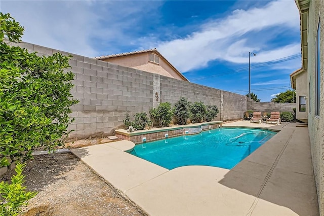 3539 Barrel Bronco Ct, North Las Vegas, NV 89032 - view of swimming pool with a fenced backyard and a patio area