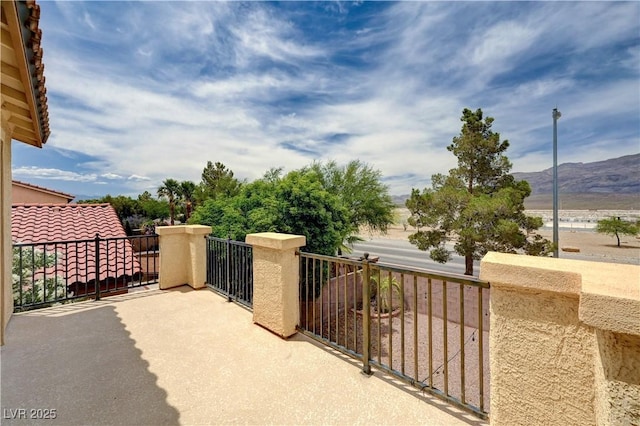 4308 Desert Haven Ave, North Las Vegas, NV 89085 - view of patio / terrace featuring a balcony and a mountain view