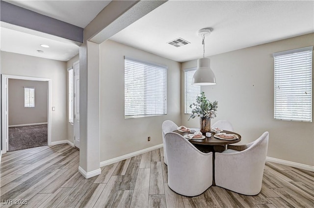 4308 Desert Haven Ave, North Las Vegas, NV 89085 - dining space featuring light wood-style floors and baseboards