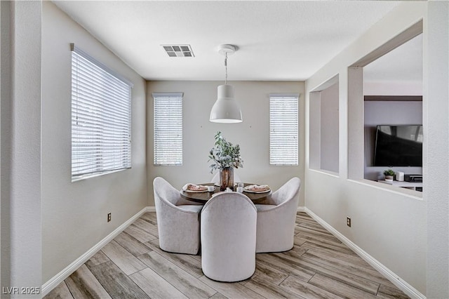 4308 Desert Haven Ave, North Las Vegas, NV 89085 - dining space featuring light wood finished floors and baseboards