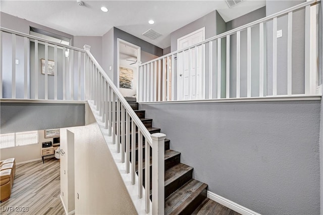 4308 Desert Haven Ave, North Las Vegas, NV 89085 - stairway with wood finished floors, baseboards, and recessed lighting