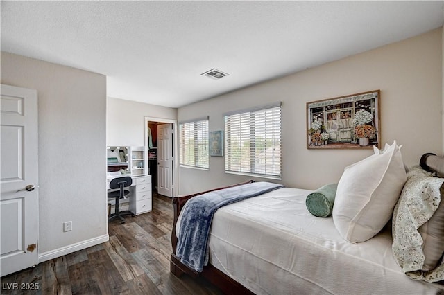4308 Desert Haven Ave, North Las Vegas, NV 89085 - bedroom featuring baseboards, an office area, and wood finished floors