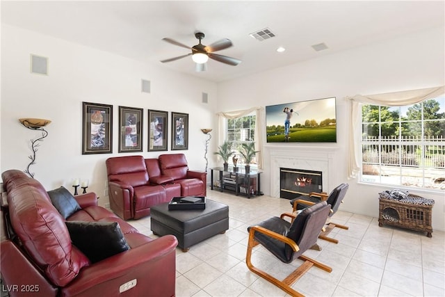 5104 Burr Oak Dr, Las Vegas, NV 89130 - living room featuring a ceiling fan, a premium fireplace, light tile patterned floors, and recessed lighting