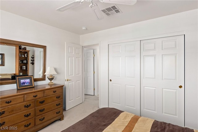 5104 Burr Oak Dr, Las Vegas, NV 89130 - bedroom with a closet, light colored carpet, and ceiling fan
