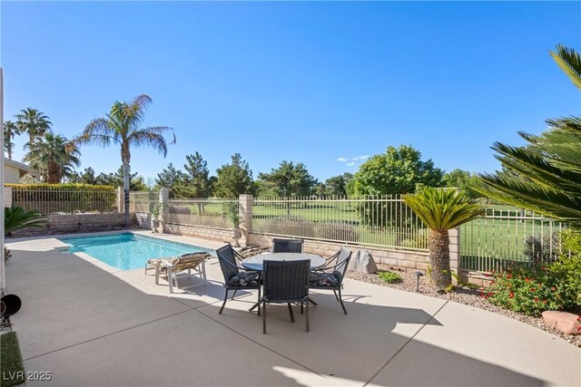 5104 Burr Oak Dr, Las Vegas, NV 89130 - view of pool featuring a patio, a fenced backyard, and outdoor dining space