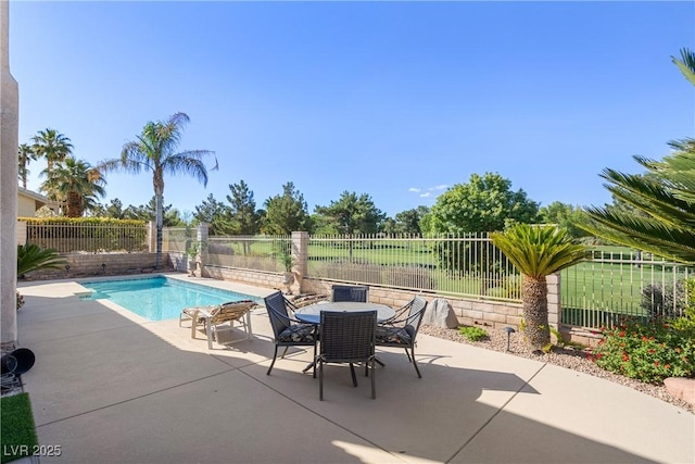 5104 Burr Oak Dr, Las Vegas, NV 89130 - view of pool featuring a patio area, a fenced backyard, and outdoor dining area