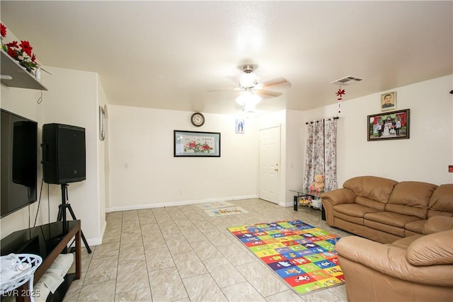 6520 Blooming Sun Ct, Las Vegas, NV 89142 - living area with a ceiling fan, baseboards, and light marble finish flooring