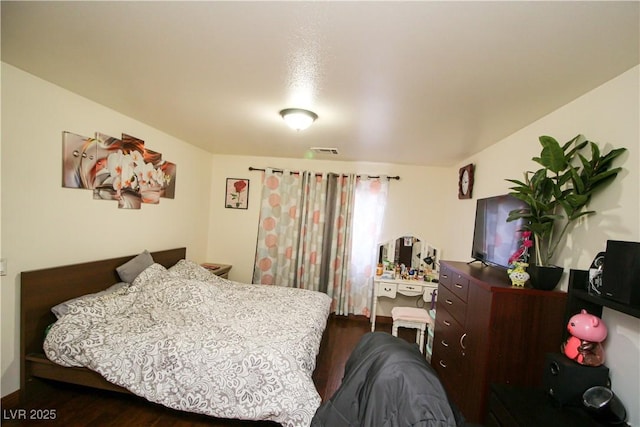 6520 Blooming Sun Ct, Las Vegas, NV 89142 - bedroom featuring dark wood-style floors