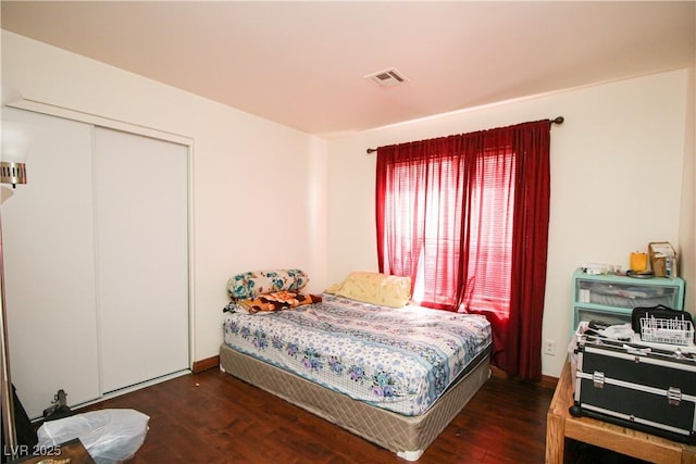 6520 Blooming Sun Ct, Las Vegas, NV 89142 - bedroom with wood finished floors and a closet