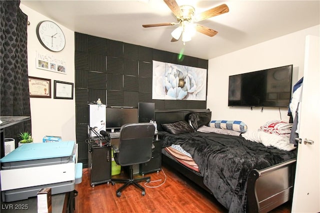 6520 Blooming Sun Ct, Las Vegas, NV 89142 - bedroom featuring wood finished floors, a desk, and a ceiling fan