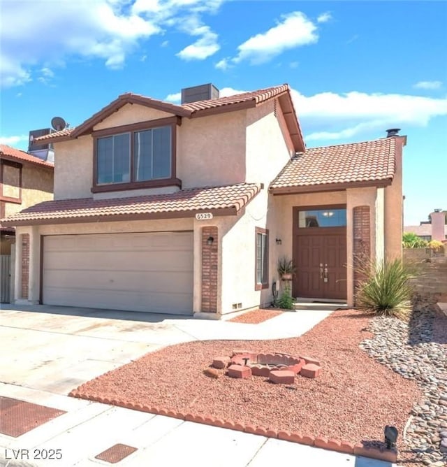 6529 Hartwood Rd, Las Vegas, NV 89108 - view of front of home featuring a chimney, stucco siding, and driveway
