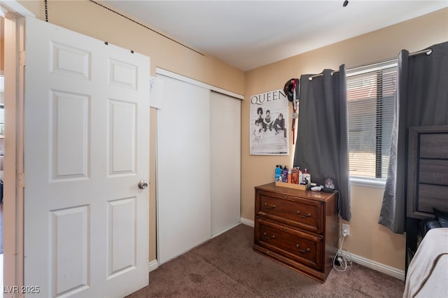 6529 Hartwood Rd, Las Vegas, NV 89108 - carpeted bedroom with a closet and baseboards