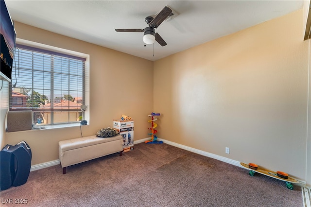 6529 Hartwood Rd, Las Vegas, NV 89108 - living area featuring carpet, a ceiling fan, and baseboards