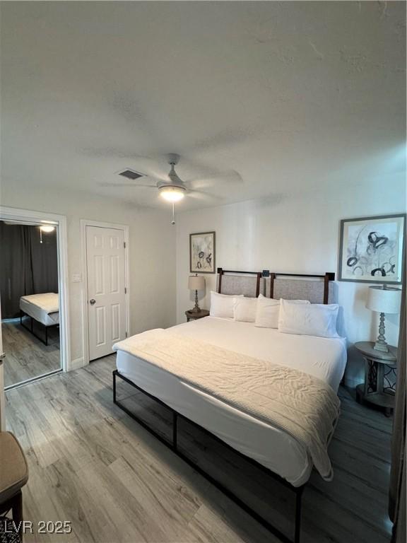 621 S 9th St, Las Vegas, NV 89101 - bedroom featuring wood finished floors and a ceiling fan