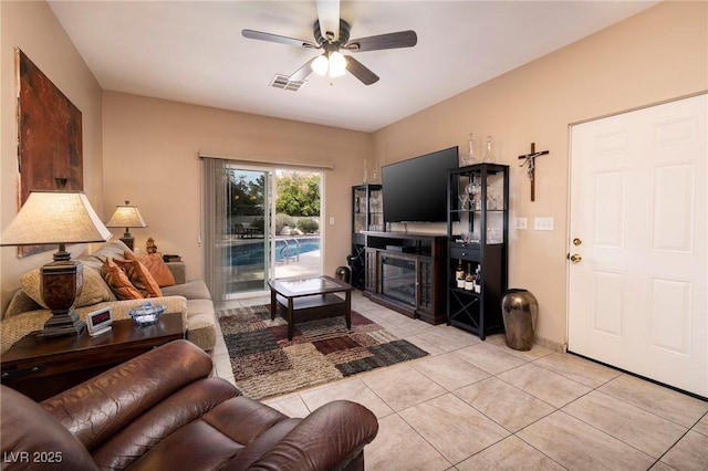 4219 E Pinecrest Cir, Las Vegas, NV 89121 - living area with light tile patterned flooring and ceiling fan